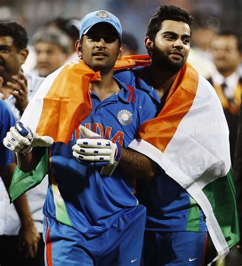 MS Dhoni and Virat Kohli with the India flag | ESPNcricinfo.com