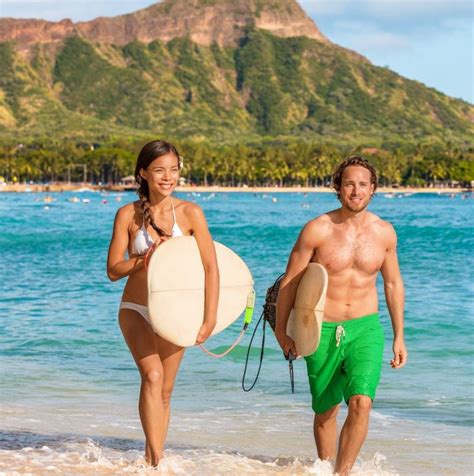 Hawaii surfers people having fun surfing on Waikiki beach, Honolulu ...