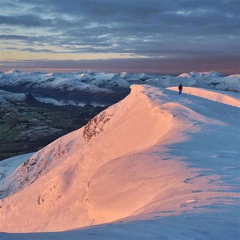 Lake District on Instagram: “Our favourite shot of the week - Dawn breaks across the snow capped ...