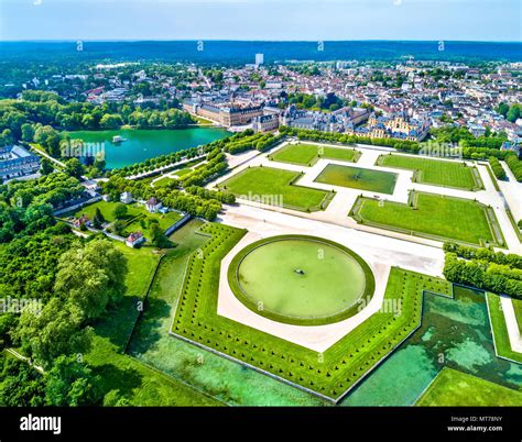 Aerial view of Chateau de Fontainebleau with its gardens, a UNESCO World Heritage Site in France ...