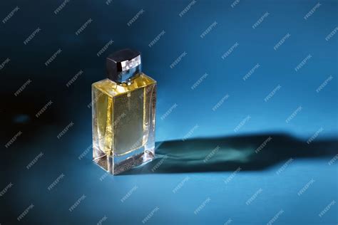 Premium Photo | Men perfume on dark background