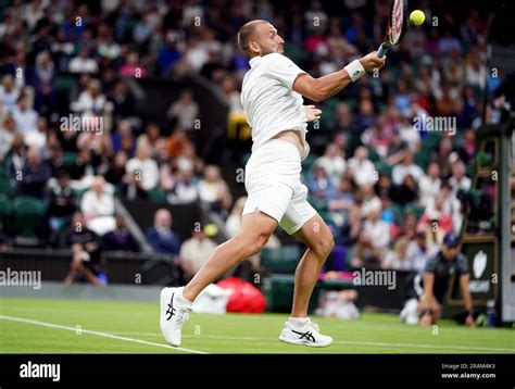 Daniel Evans in action against Quentin Halys (not pictured) on day two of the 2023 Wimbledon ...