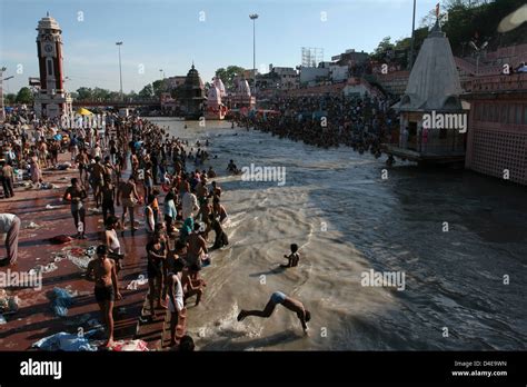 Pilgrims take the holy bath at Haridwar Stock Photo - Alamy