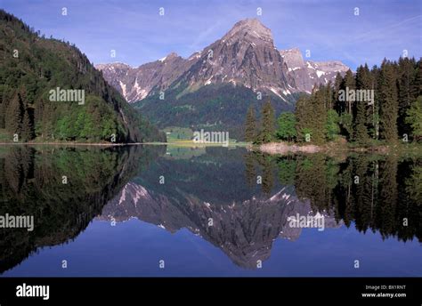 Canton Glarus lake mountain lake mountains Obersee reflection scenery ...