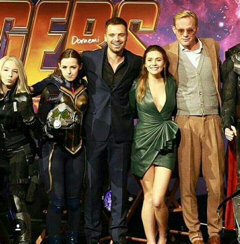 the cast of avengers 3 pose for a photo