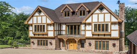 Traditional mock tudor style timber frame self build house | Wooden house design, Unique house ...