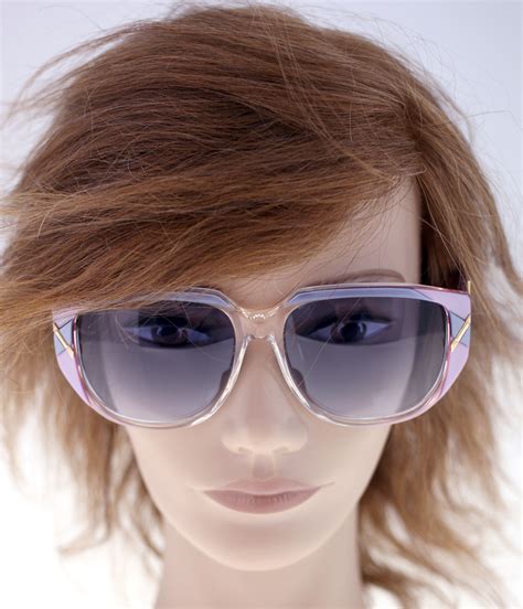 SUNGLASSES, Luxottica. Vintage & Designer Fashion - Auctionet