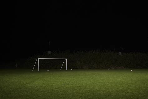 Empty Soccer Field At Night Photograph