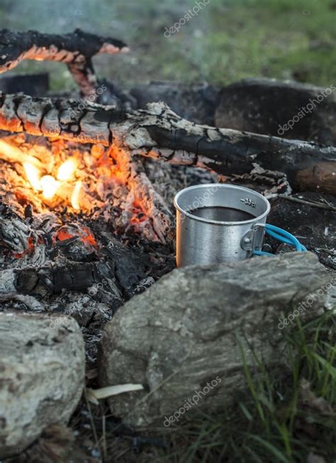 Making coffee on campfire — Stock Photo © deyangeorgiev2 #115923274