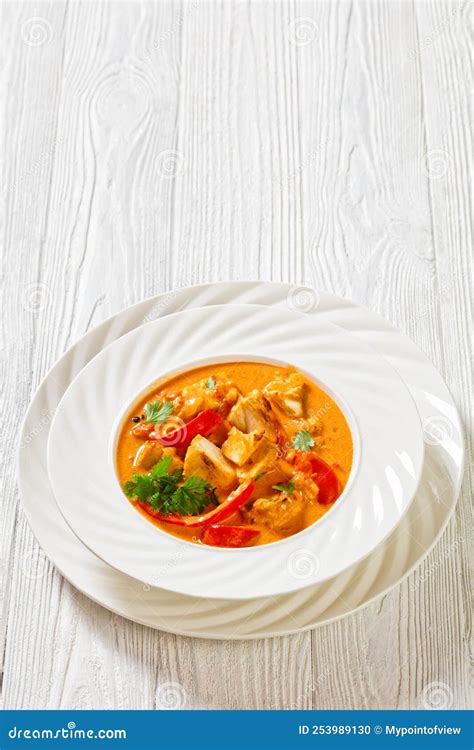 Fish Stew Cooked with Coconut Milk and Veggies Stock Photo - Image of ...