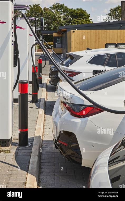 The future is here: electric vehicles charging at an electric vehicle ...