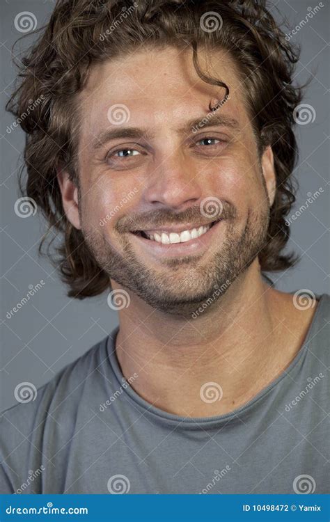 Portrait of a Smiling Young Man Stock Photo - Image of looking, hairstyle: 10498472