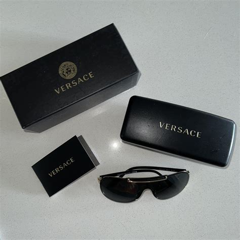 Versace Men's Black and Gold Sunglasses | Depop