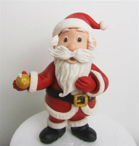 Santa Claus Out Of Fondant - CakeCentral.com