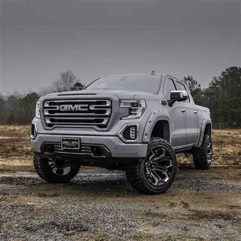 GMC BLACK WIDOW LIFTED TRUCKS — SCA Performance | Black Widow Lifted Trucks