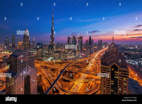 Dubai skyline at sunset Stock Photo - Alamy