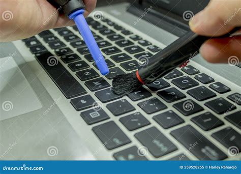 Cleaning Laptop Keyboard Concept Stock Image - Image of male, caring: 259528255