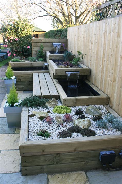 garden with water features bench fencing panel garden design Backyard ...