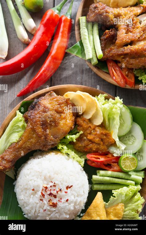 Ayam Penyet rice Stock Photo - Alamy