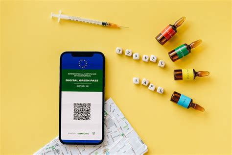 Vaccine Ampules and a Smartphone · Free Stock Photo