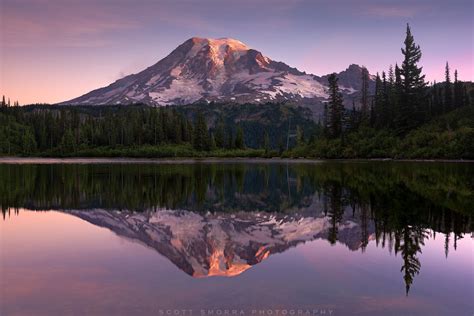 Rise Up - Sunrise aplenglow illuminating the summit of Mt Rainier (14,411 feet) at Bench Lak ...