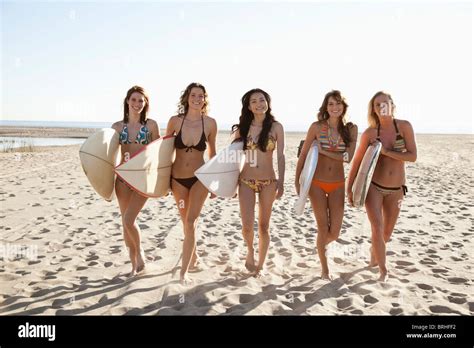 Surfers on Zuma Beach, Malibu, California, USA Stock Photo - Alamy