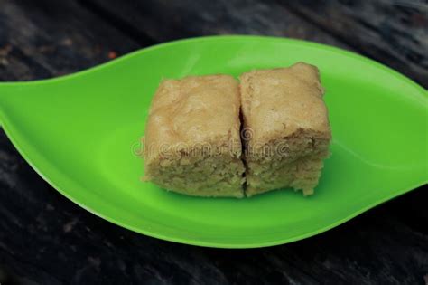 Home Made Brown Sugar Cake on a Green Plate on a Wooden Texture Table Stock Photo - Image of ...