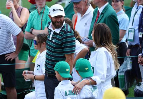 Paulina Gretzky caddies for Dustin Johnson before 2023 Masters