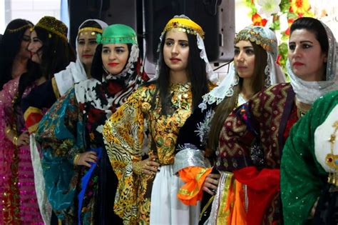 Syria's Kurds hit catwalk to promote traditional attire