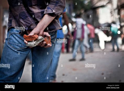 Stone pelting hi-res stock photography and images - Alamy