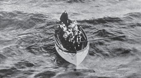 Titanic Lifeboat 6 approaches the rescue ship Carpathia, with quartermaster Robert Hitchens in ...