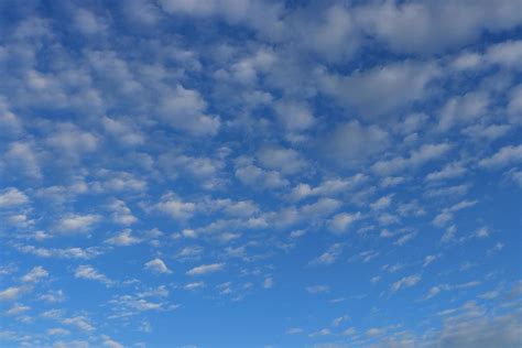 Altocumulus clouds and blue sky background. 7423695 Stock Photo at Vecteezy