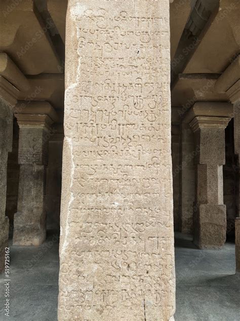 Inscriptions of Tamil language carved on the stone walls at Kanchi ...