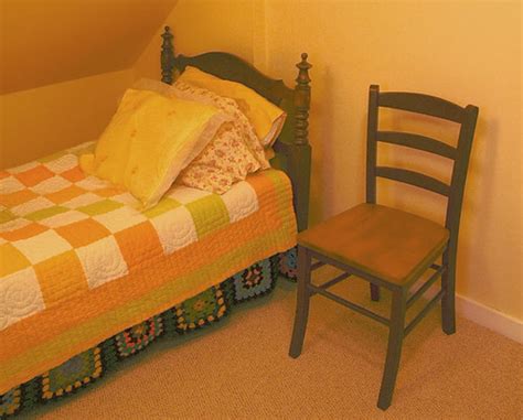 French Hobbit country style bed with simple wooden chair. … | Flickr