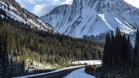 Download wallpaper 3840x2160 mountain, forest, road, snow, winter 4k uhd 16:9 hd background