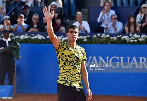 Spain's Carlos Alcaraz waves after winning his ATP Barcelona Open ...