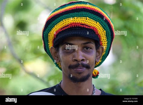 Indigenous man with a colorful Rastafarian hat, Portrait, Praslin Stock Photo: 88056915 - Alamy