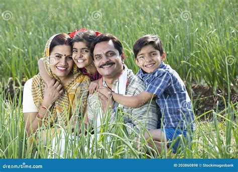 Rural Family of Farmer on Agriculture Field Stock Photo - Image of people, embracing: 203860898