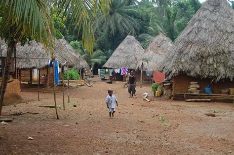 A typical Sierra Leonian Village, people often have no electricity or clean water, but the ...