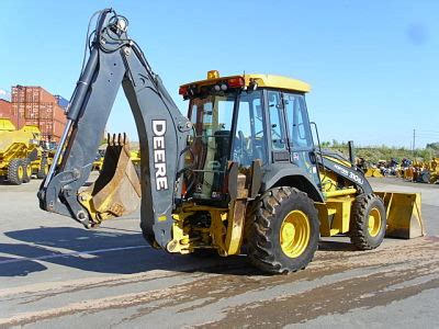 Backhoe Loader Review: John Deere 310SJ vs. John Deere 310E