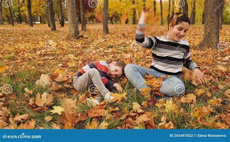 Kids Playing in Autumn Park. Kids Having Fun in Park Stock Footage ...