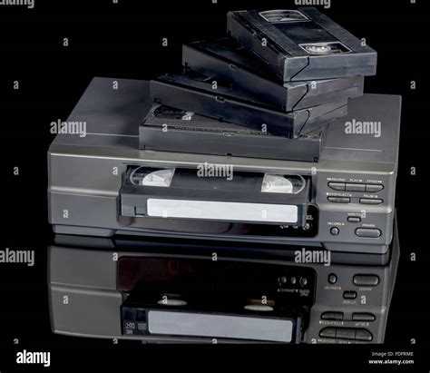 Antique VCR player with original tapes Stock Photo - Alamy