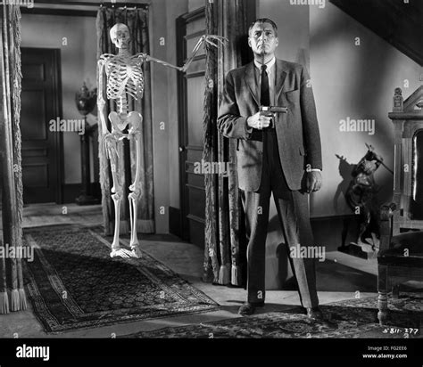 HOUSE ON HAUNTED HILL, 1959. /nAlan Marshal in a scene from 'House on Haunted Hill,' directed by ...