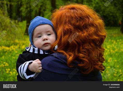 Mom Red Hair Holds Her Image & Photo (Free Trial) | Bigstock