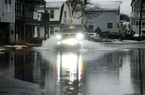 Flooding, trees and wires down across CT cause road closures ...