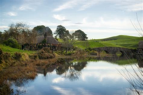 HD wallpaper: hobbiton movie set, nz, new zealand, lotr, trees, bridge ...