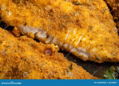 Macro Image Of Seasoned Cornmeal Breading On A Fried Catfish Fillet, Revealing The Various Herbs ...