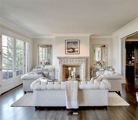 Transitional style white living room decor with modern chesterfield ...