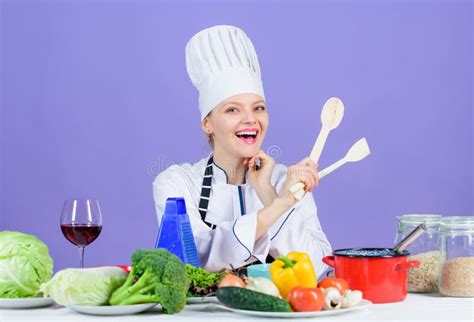 Woman Chef Cooking Healthy Food. Gourmet Main Dish Recipes. Cooking is ...