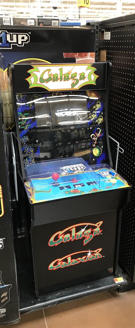 My local Walmart is selling mini Galaga arcade machines. (Sadly the ...